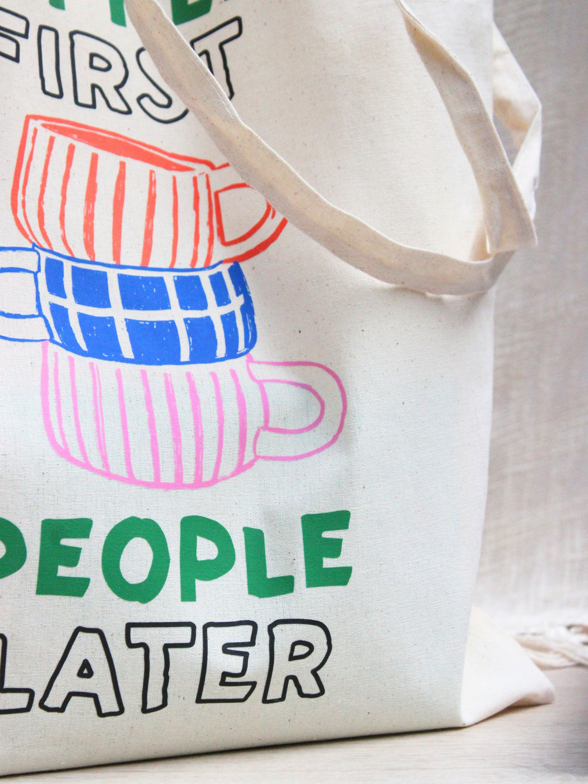 “Coffee First People Later” Tote Bag
